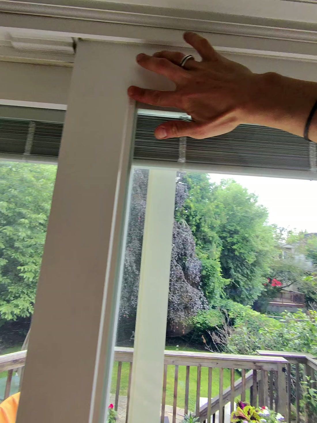 Installer positioning film on the glass